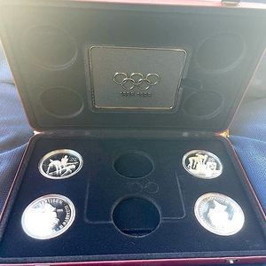 Lot of 3 1996 Olympic Coins with case and paperwork, only 4 coins.